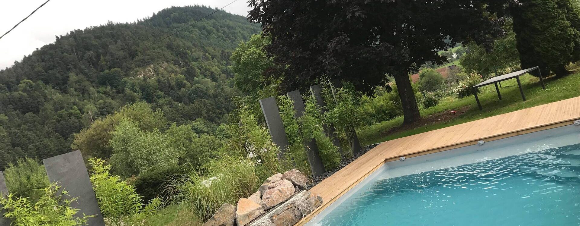 RECEIVED_1315613788621923 1920X750 | www.jardin-design-68.fr Peut-on construire une piscine sur un terrain en pente Rouffach